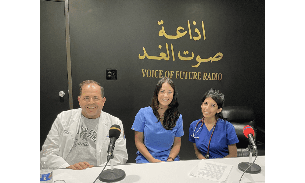 Radio show hosts in studio