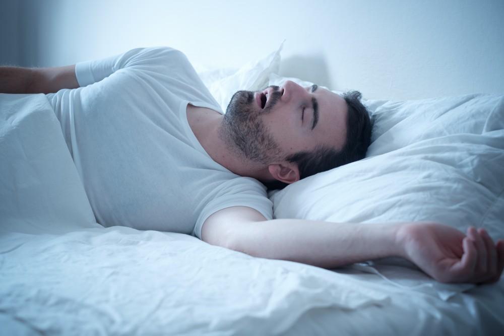 Person resting with mouth open