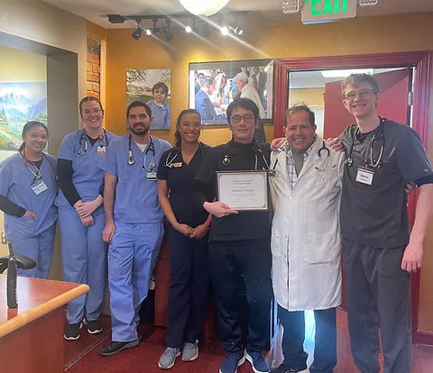 Doctors and nurses celebrating achievement