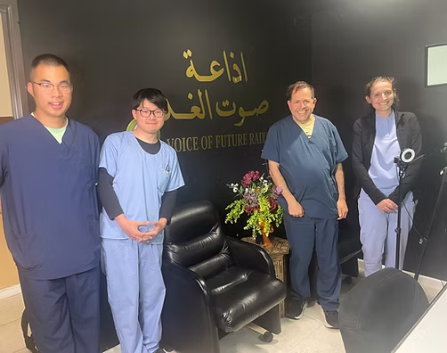 Smiling group in a studio setting