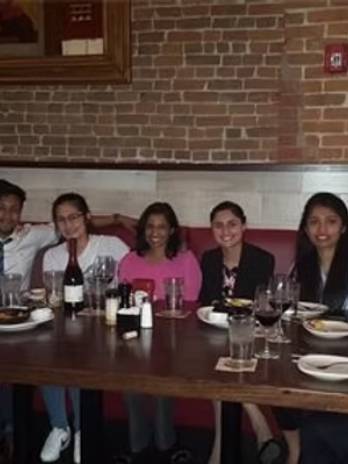 Group enjoying dinner at a restaurant