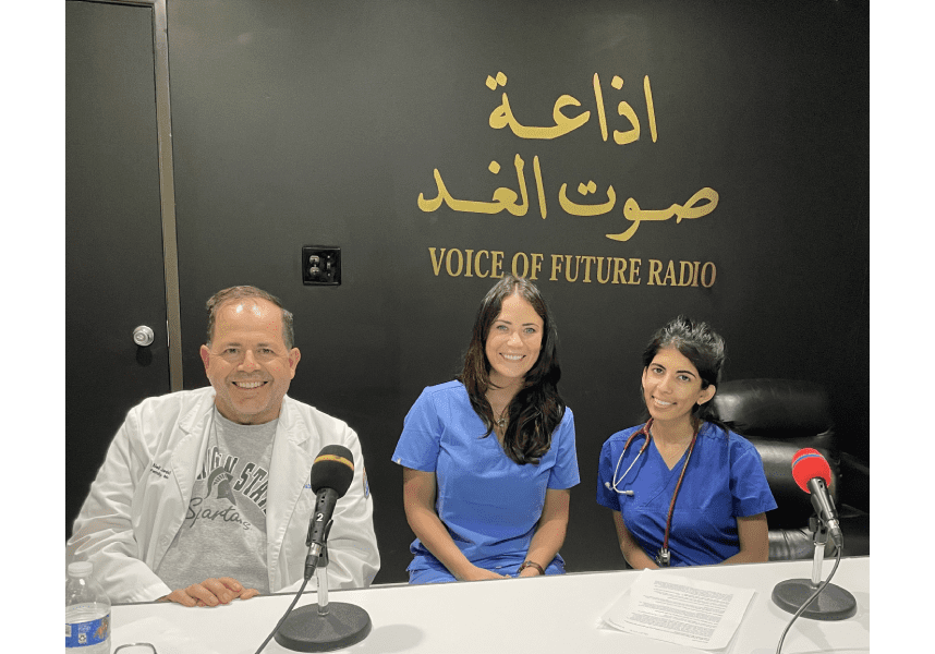 Radio show hosts in studio