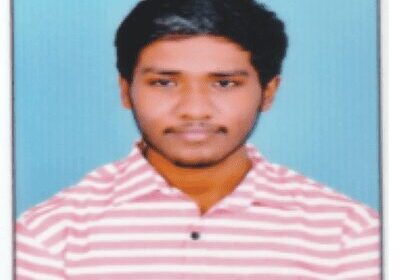 Smiling man against blue background