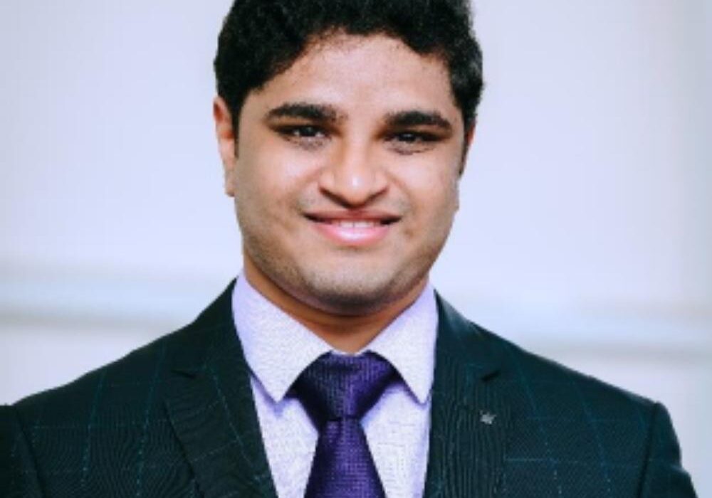 Smiling man in a suit and tie